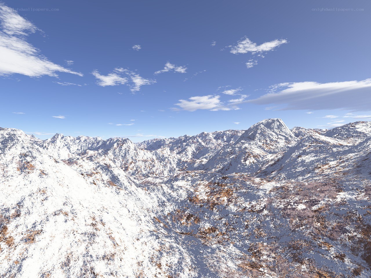 Snowy mountain range under blue sky