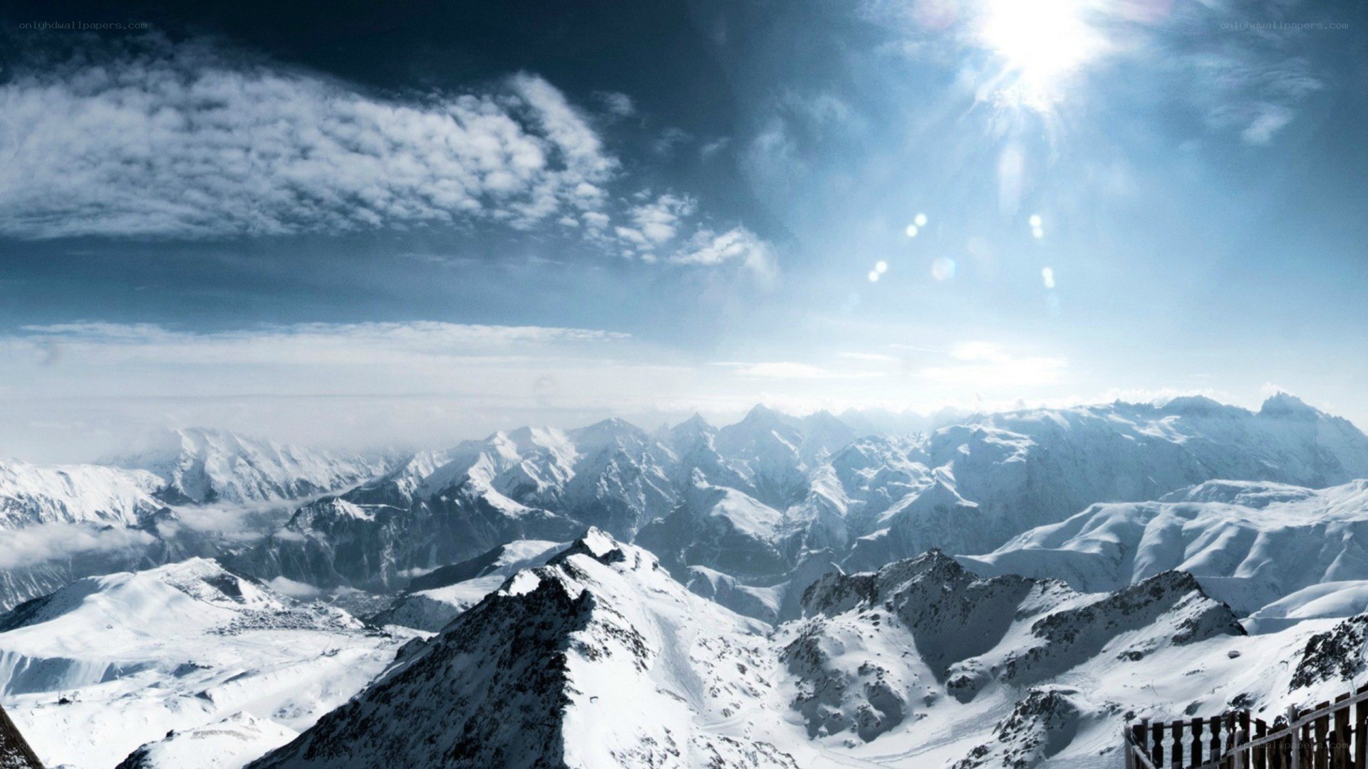 snowy mountain range under sun
