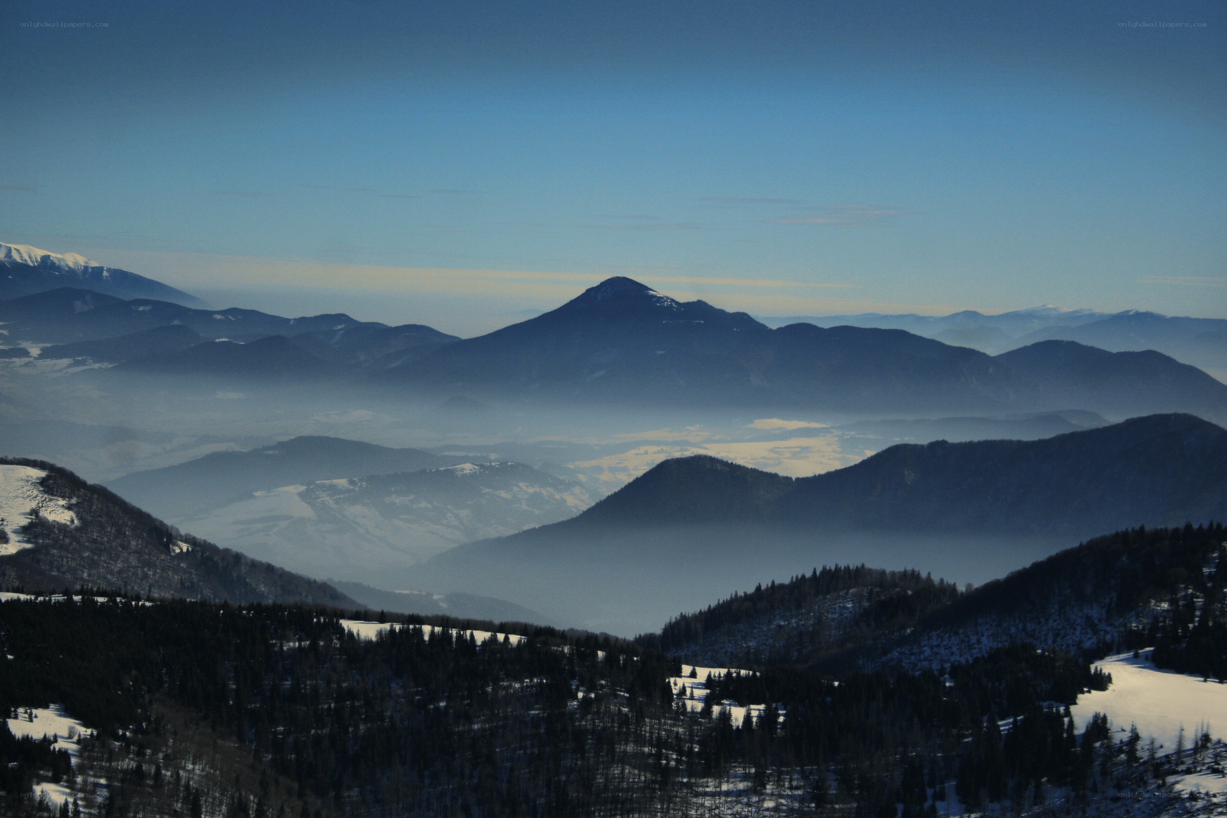 Snowy mountain range view