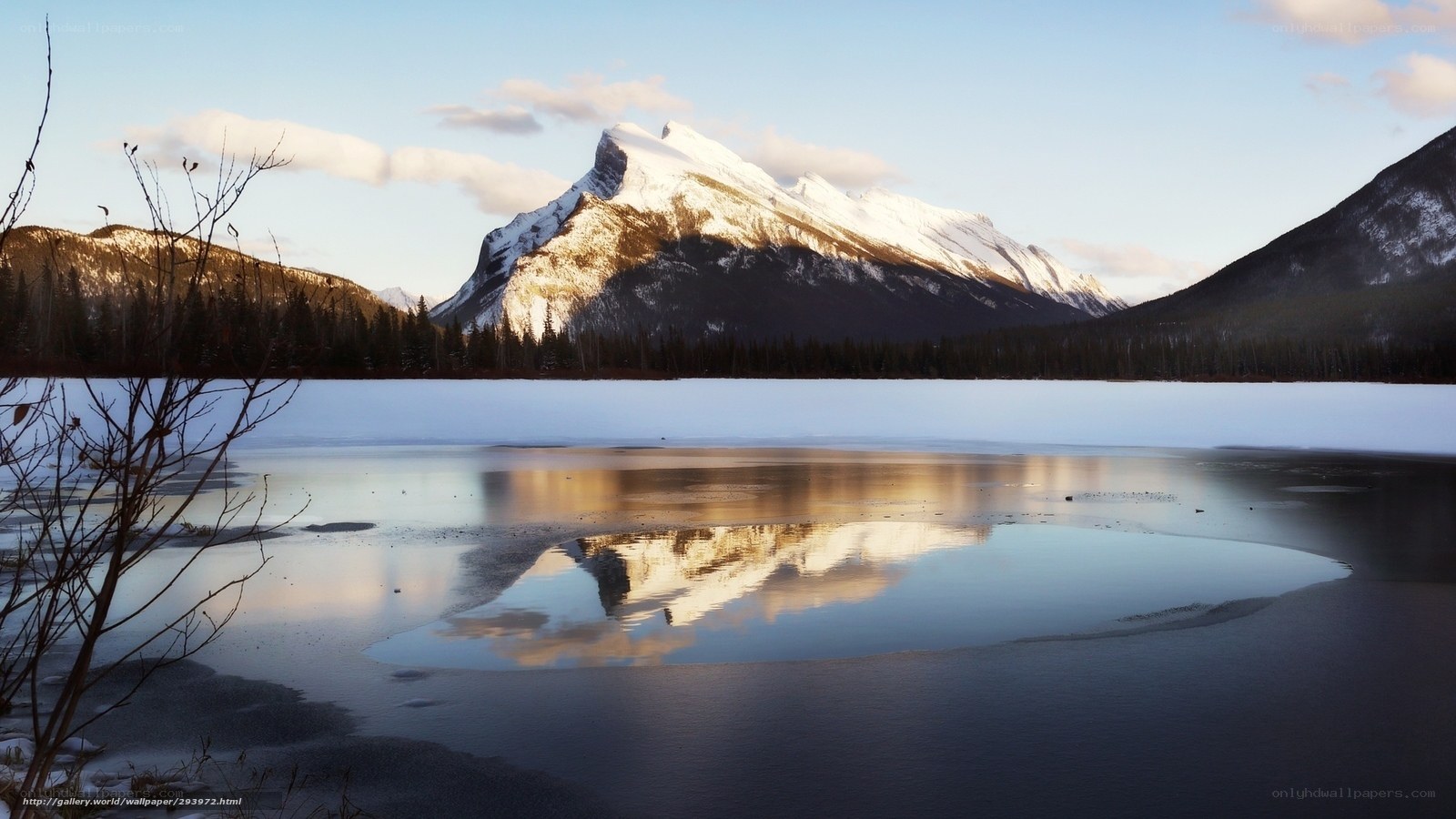 Snowy mountain reflection in lake