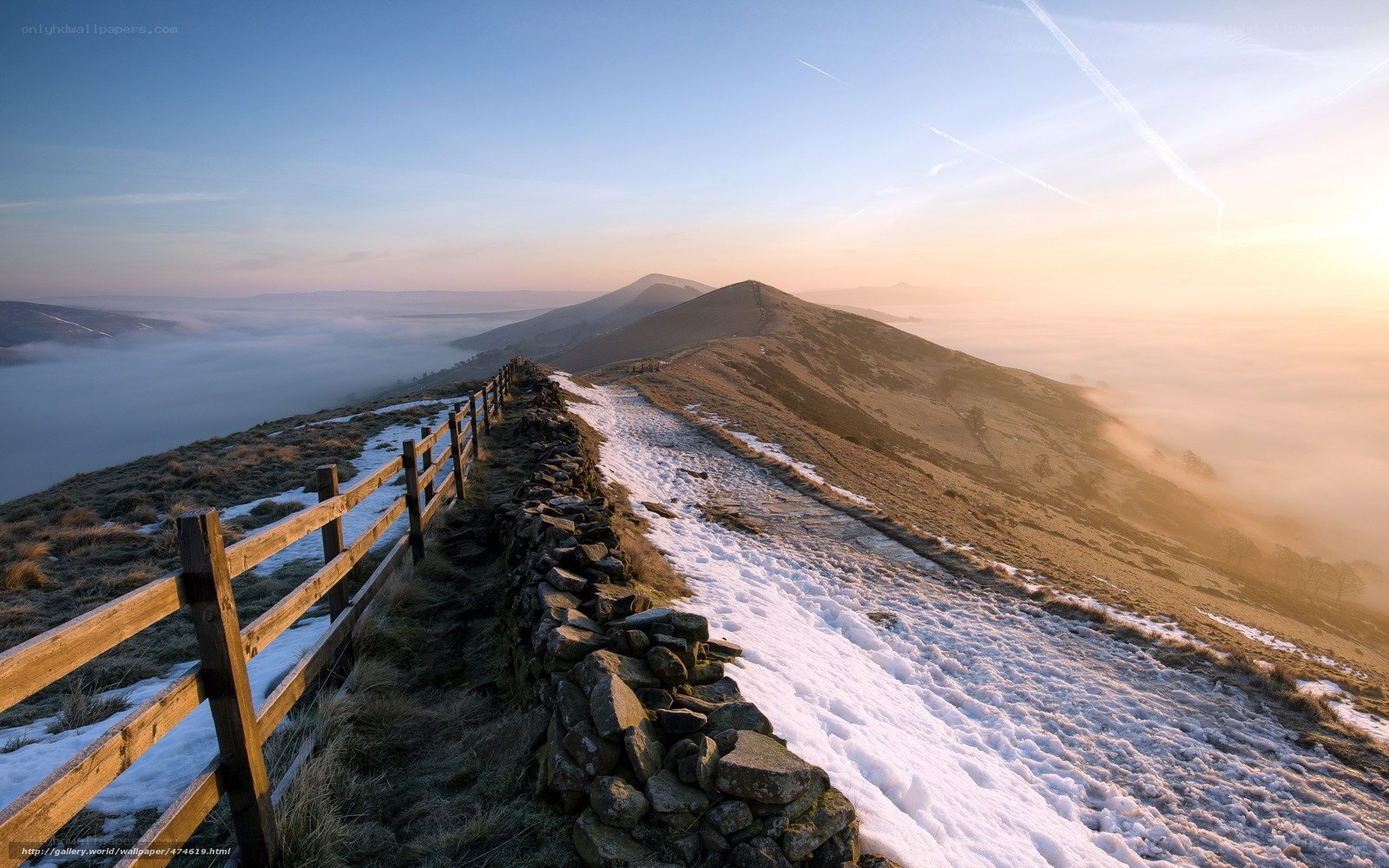 Snowy mountain ridge at sunrise