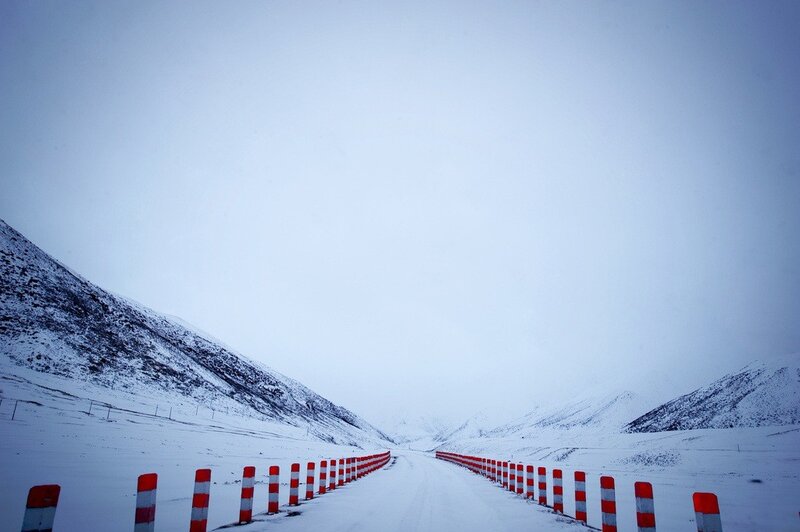 Snowy mountain road