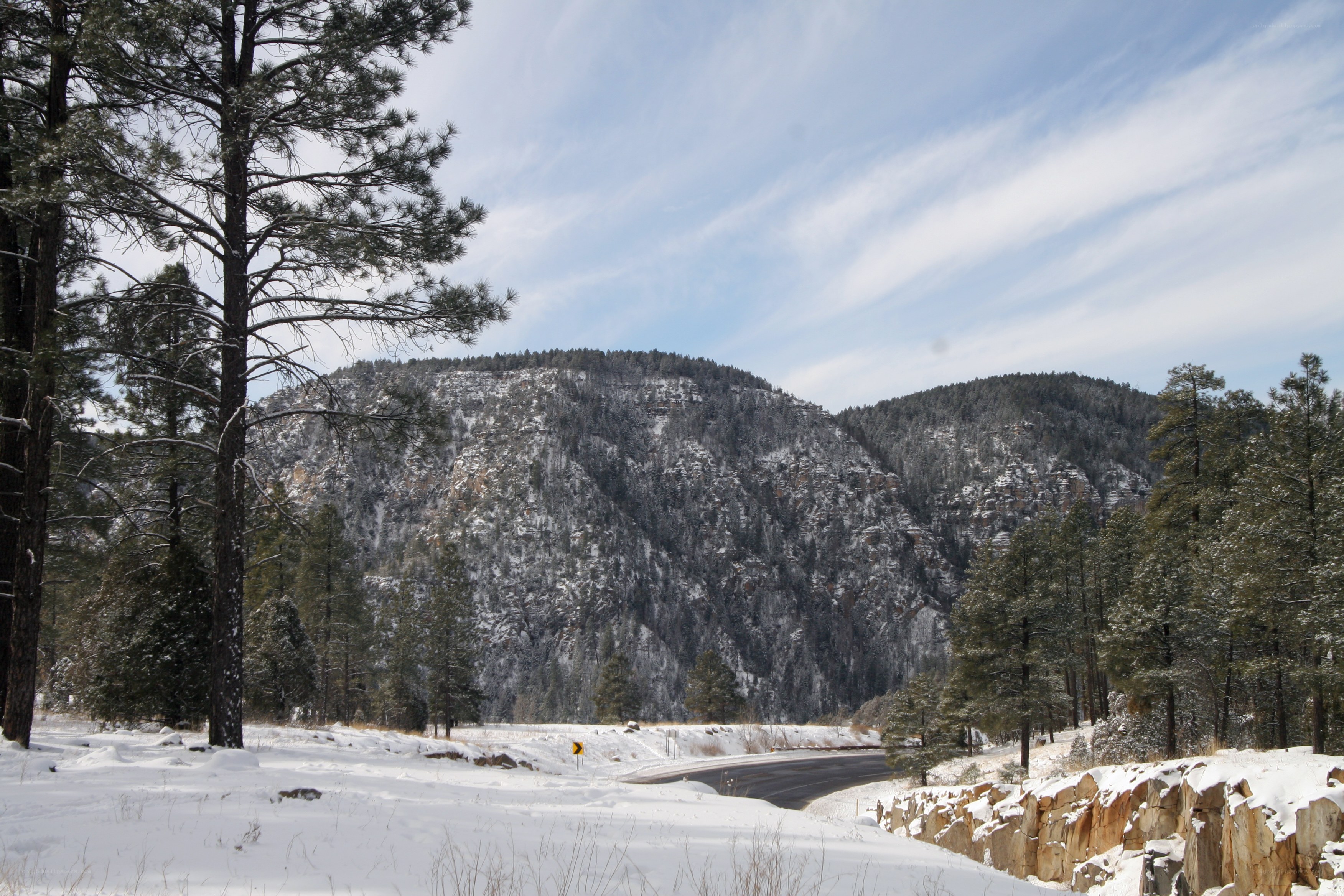 Snowy mountain road in winter