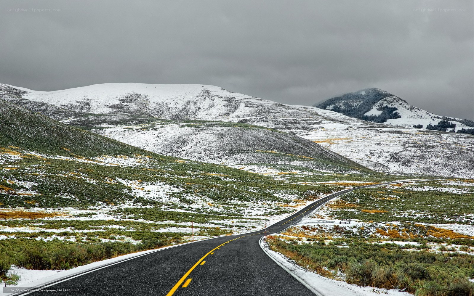 Snowy mountain road landscape