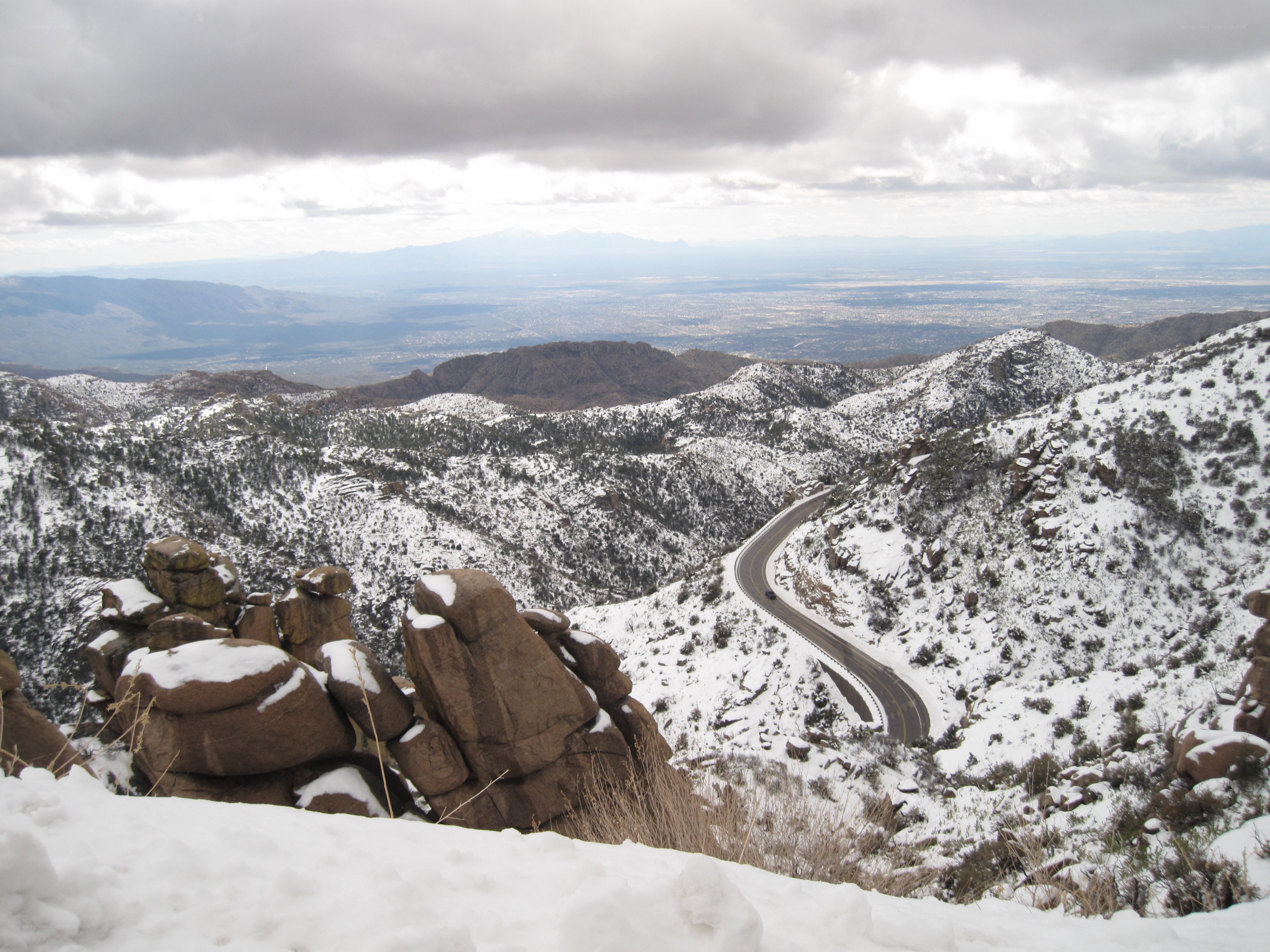 Snowy mountain road view