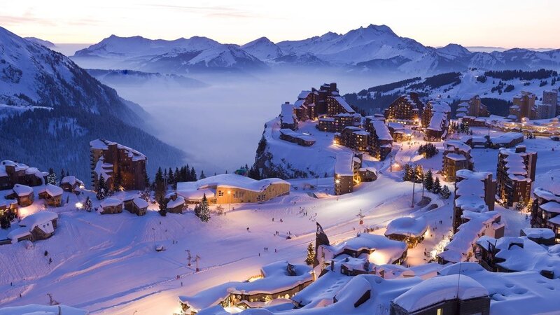 Snowy mountain ski resort at dusk