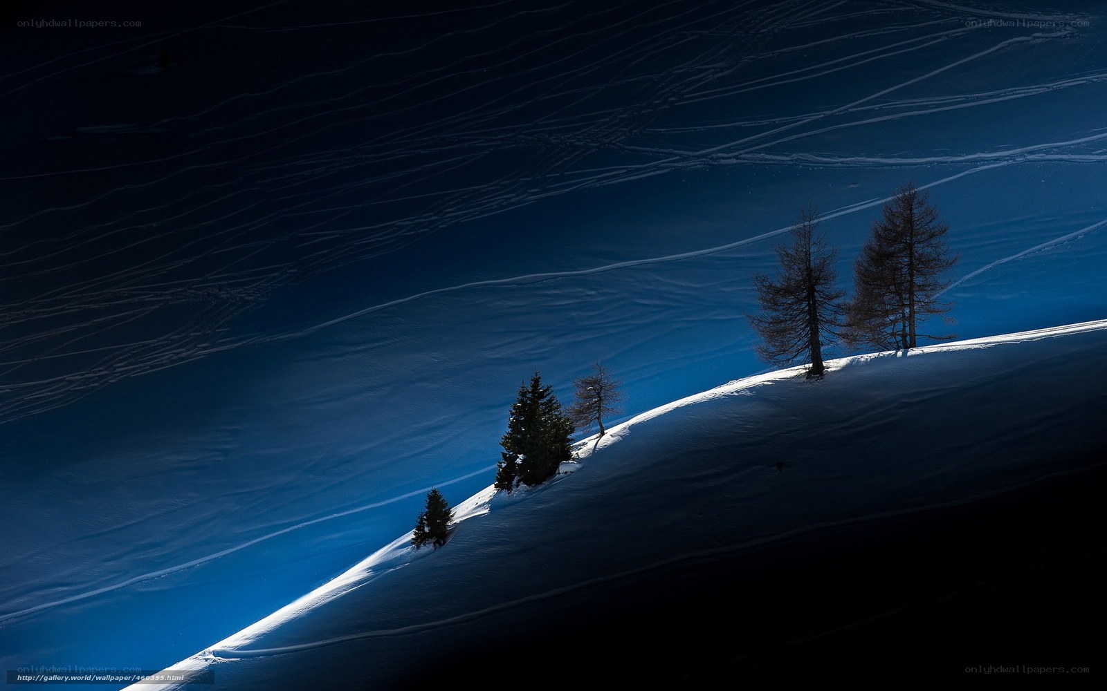 Snowy mountain slope at dusk