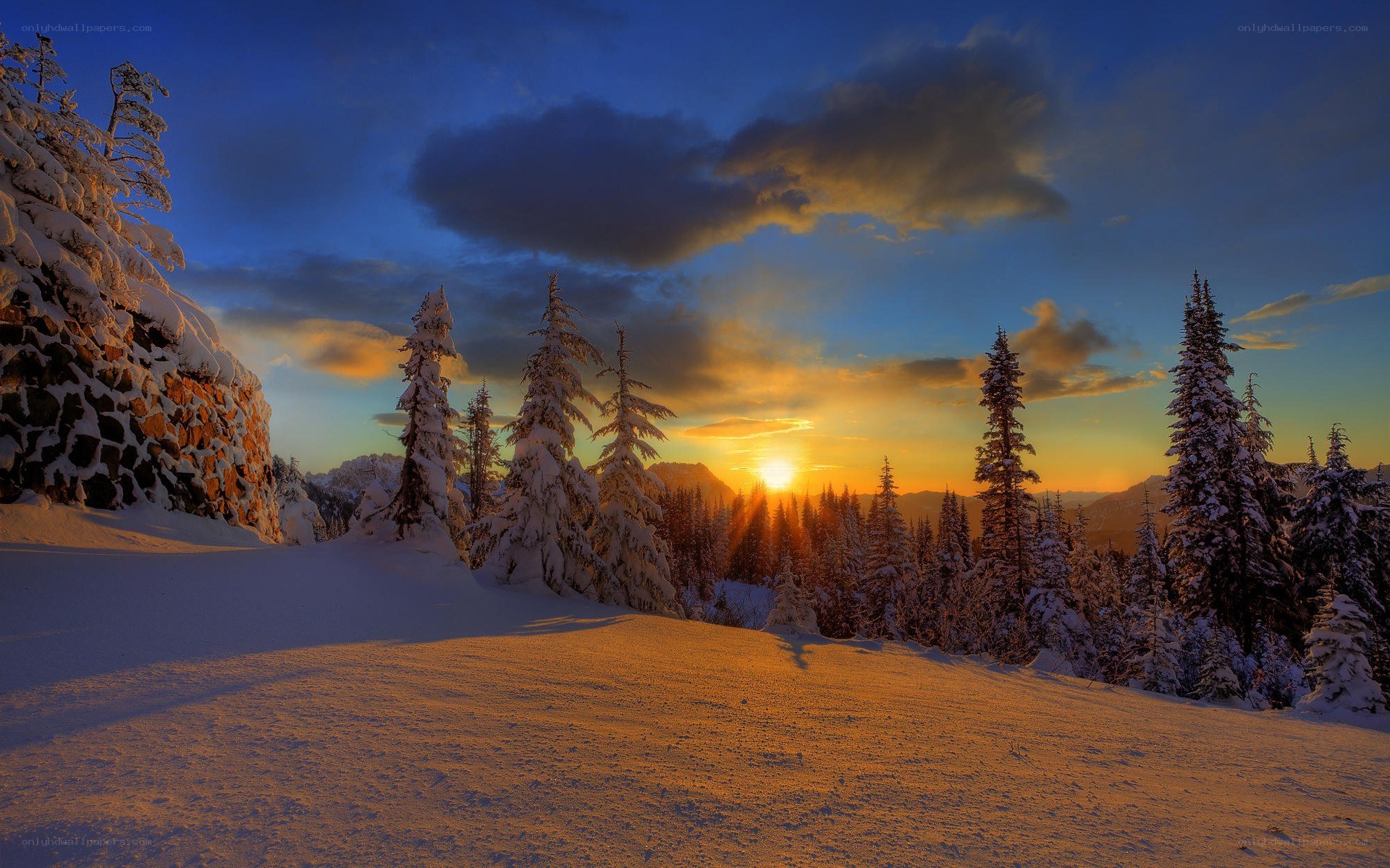 Snowy mountain sunset