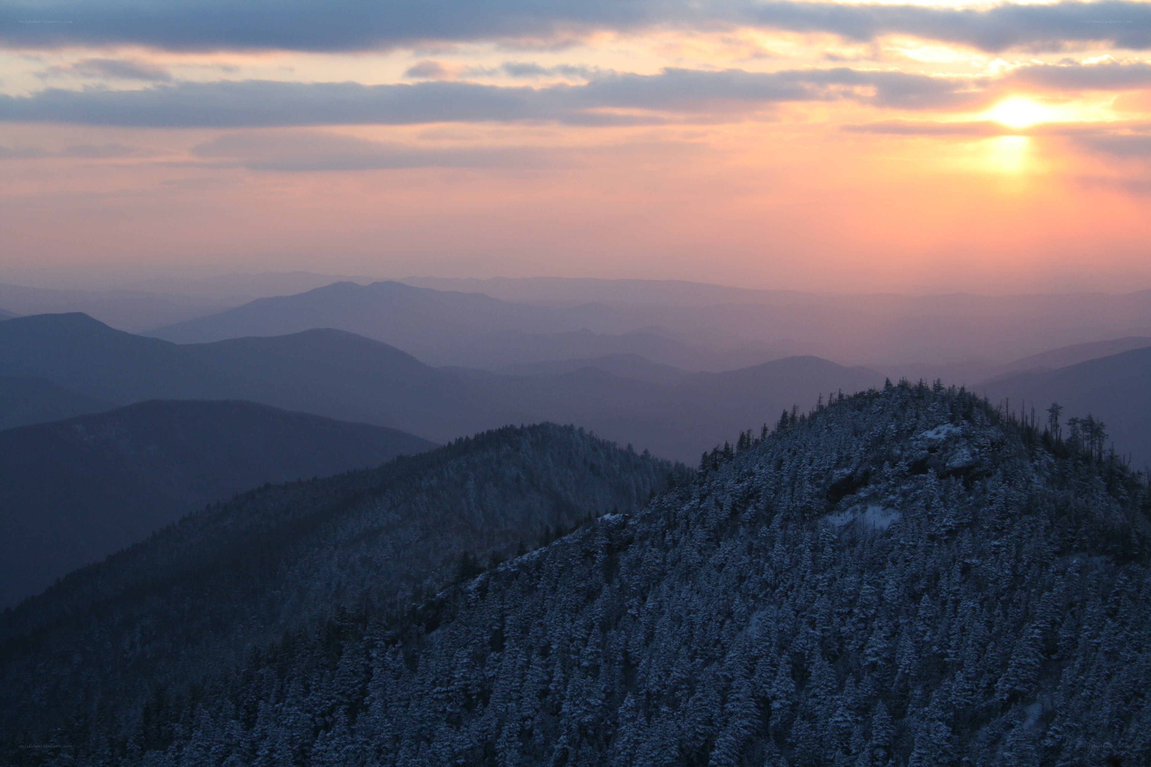 Snowy mountain sunset