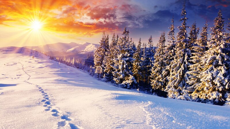 Snowy mountain sunset