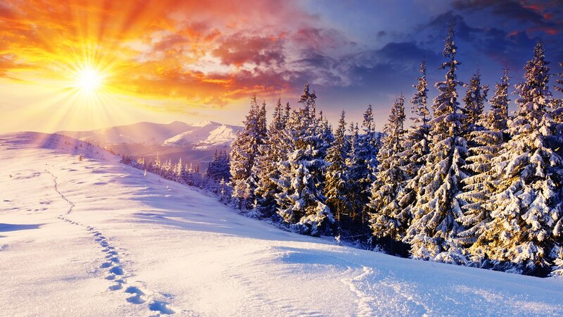 Snowy mountain sunset