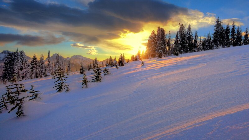 Snowy mountain sunset