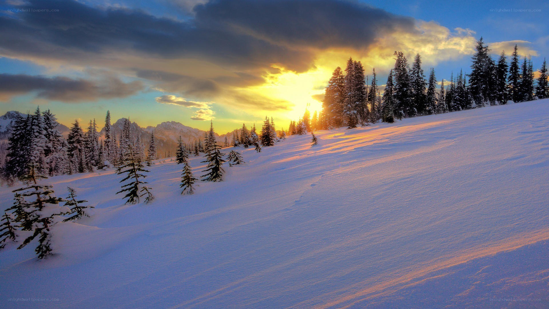 Snowy mountain sunset