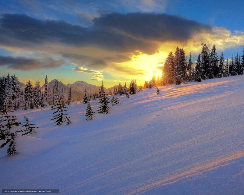 Snowy mountain sunset