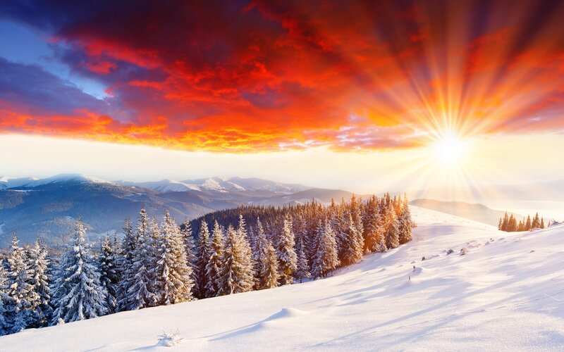 Snowy mountain sunset