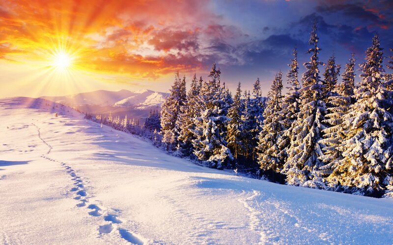 Snowy mountain sunset