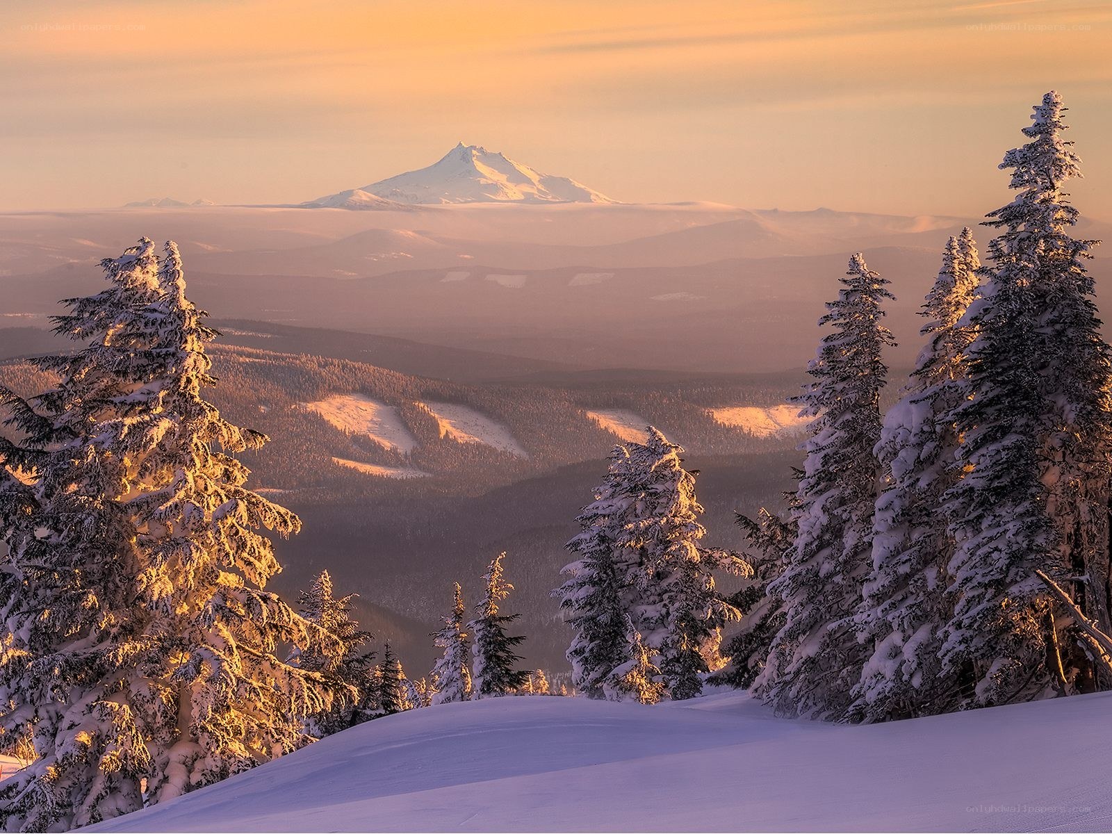 Snowy mountain sunset