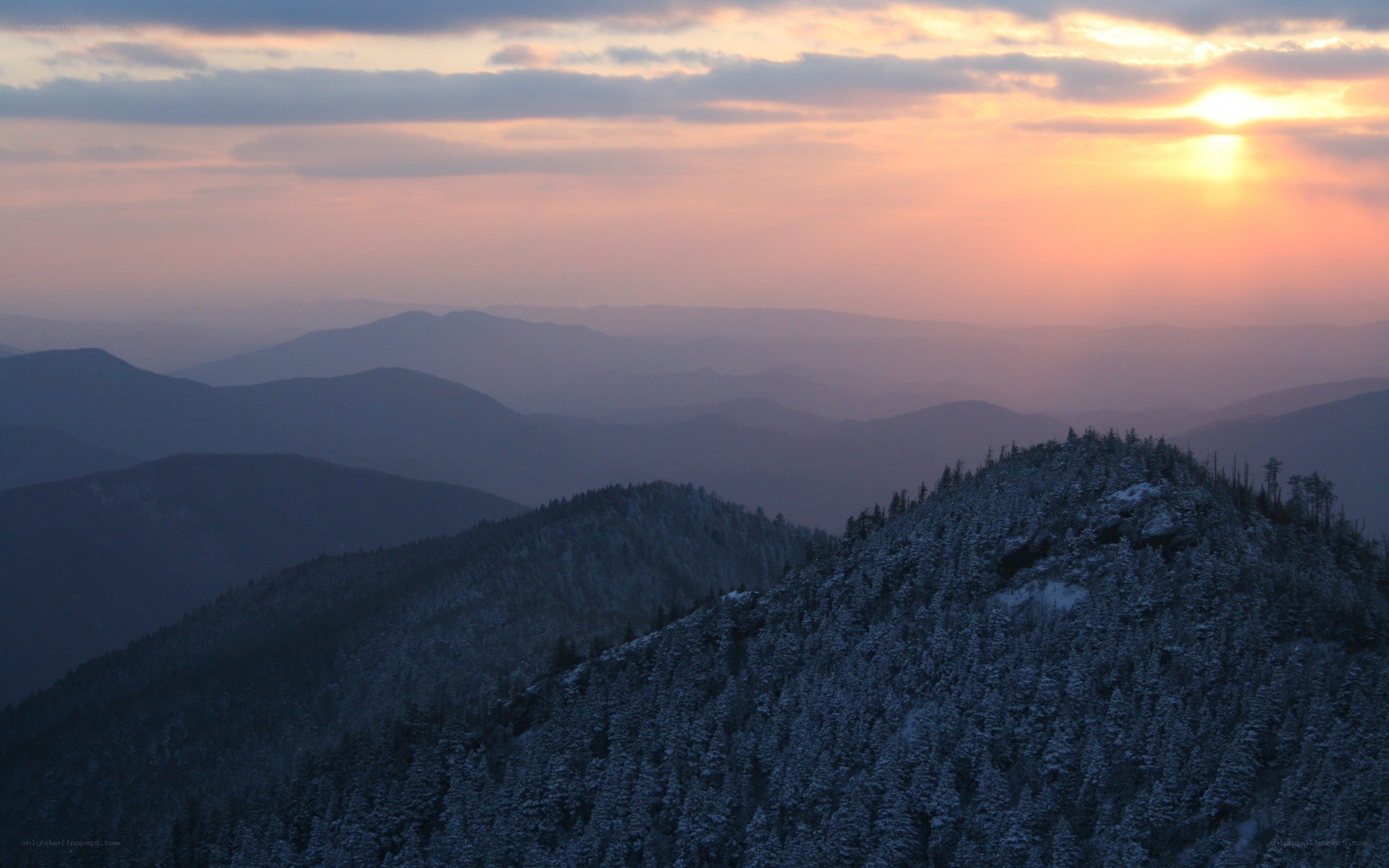 Snowy mountain sunset