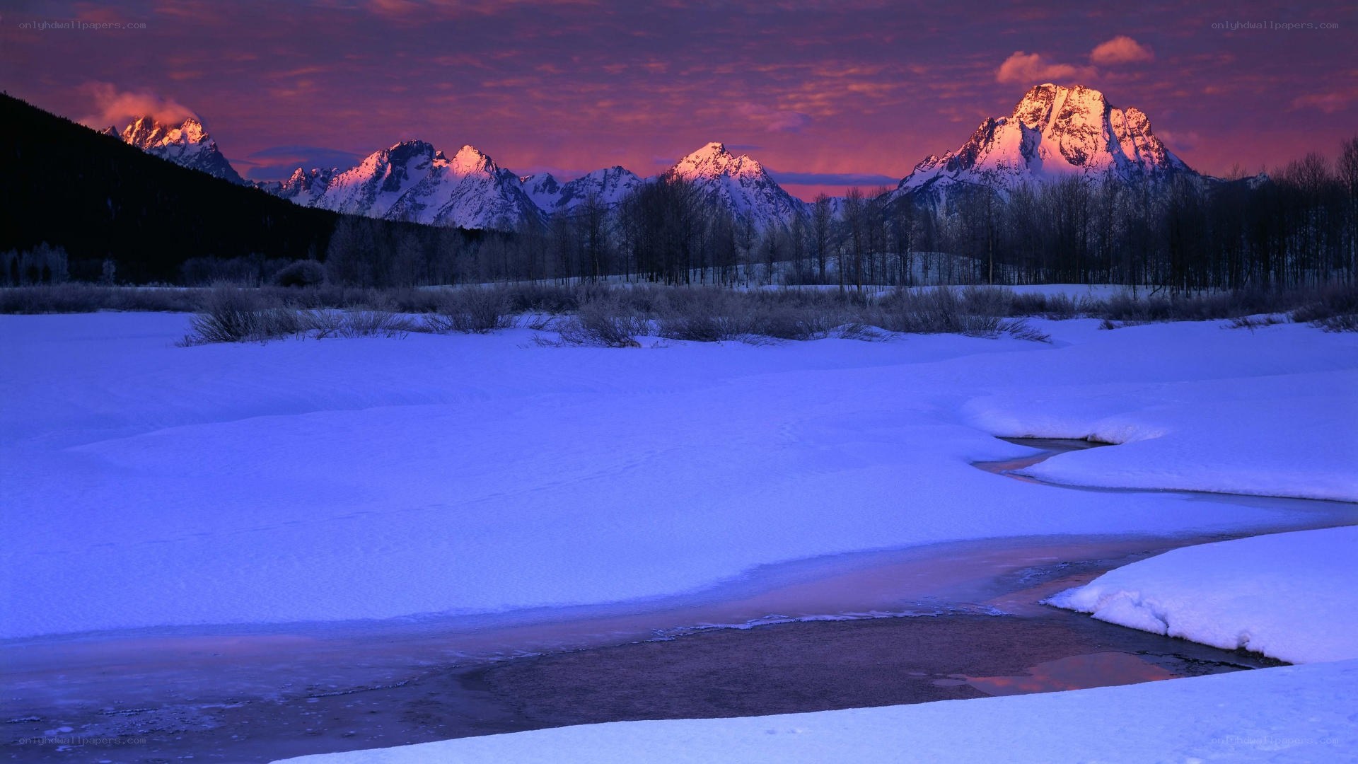 Snowy mountain sunset landscape