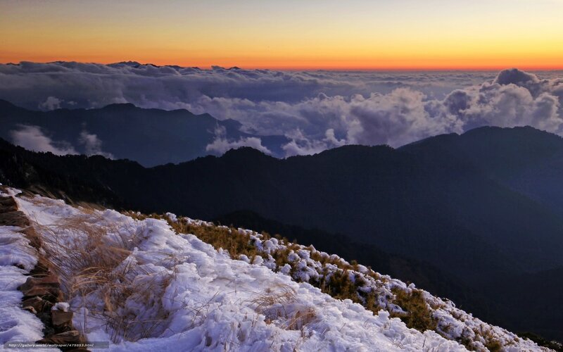 Snowy mountain sunset view