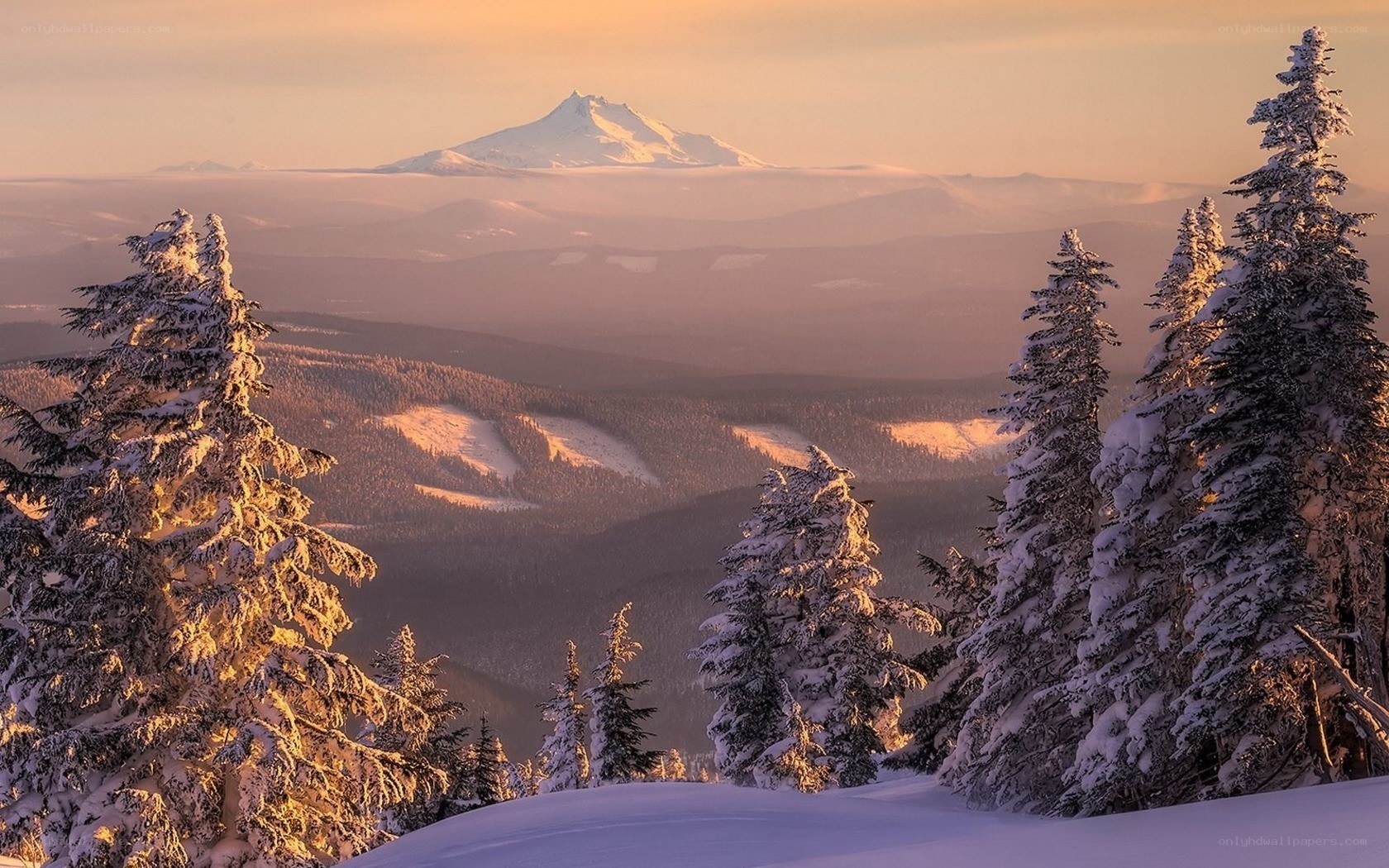 Snowy mountain sunset view