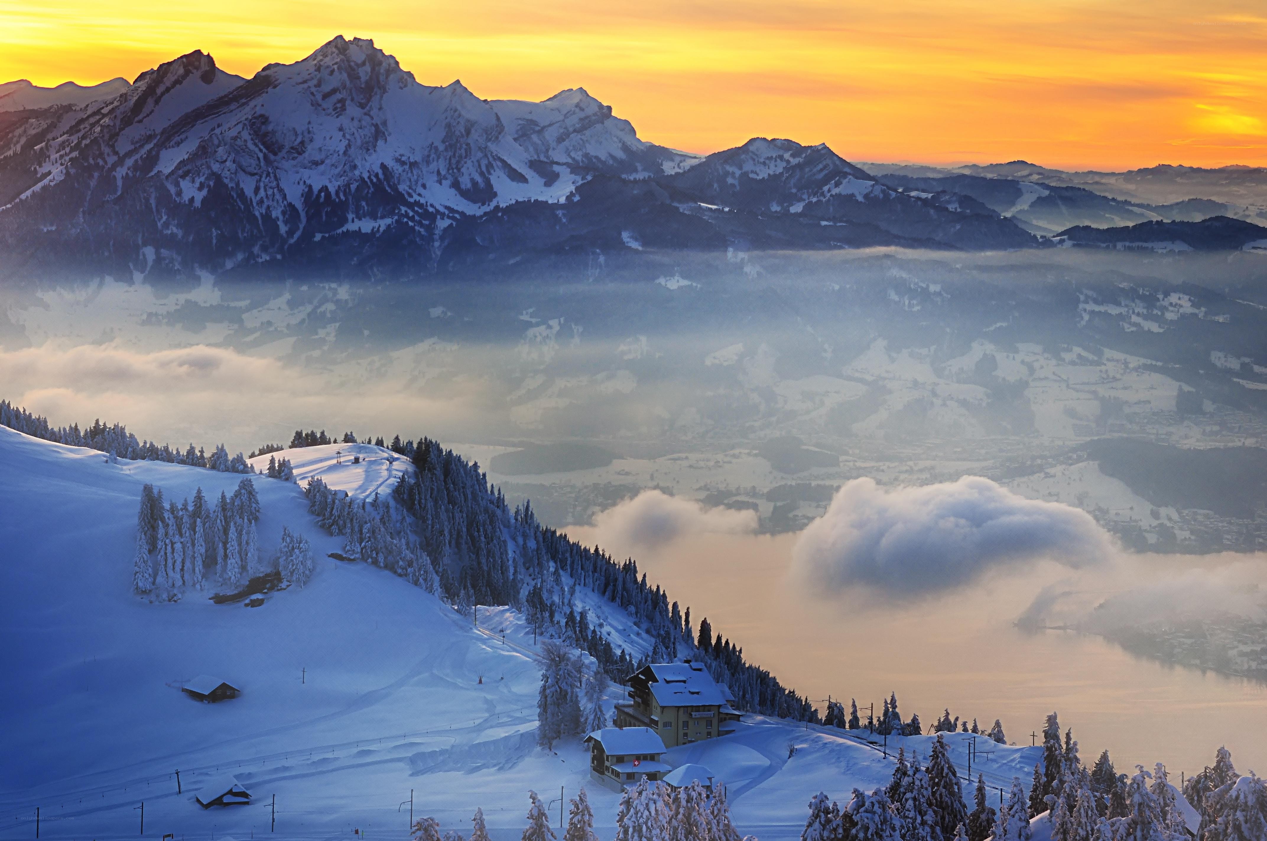 Snowy mountain sunset view