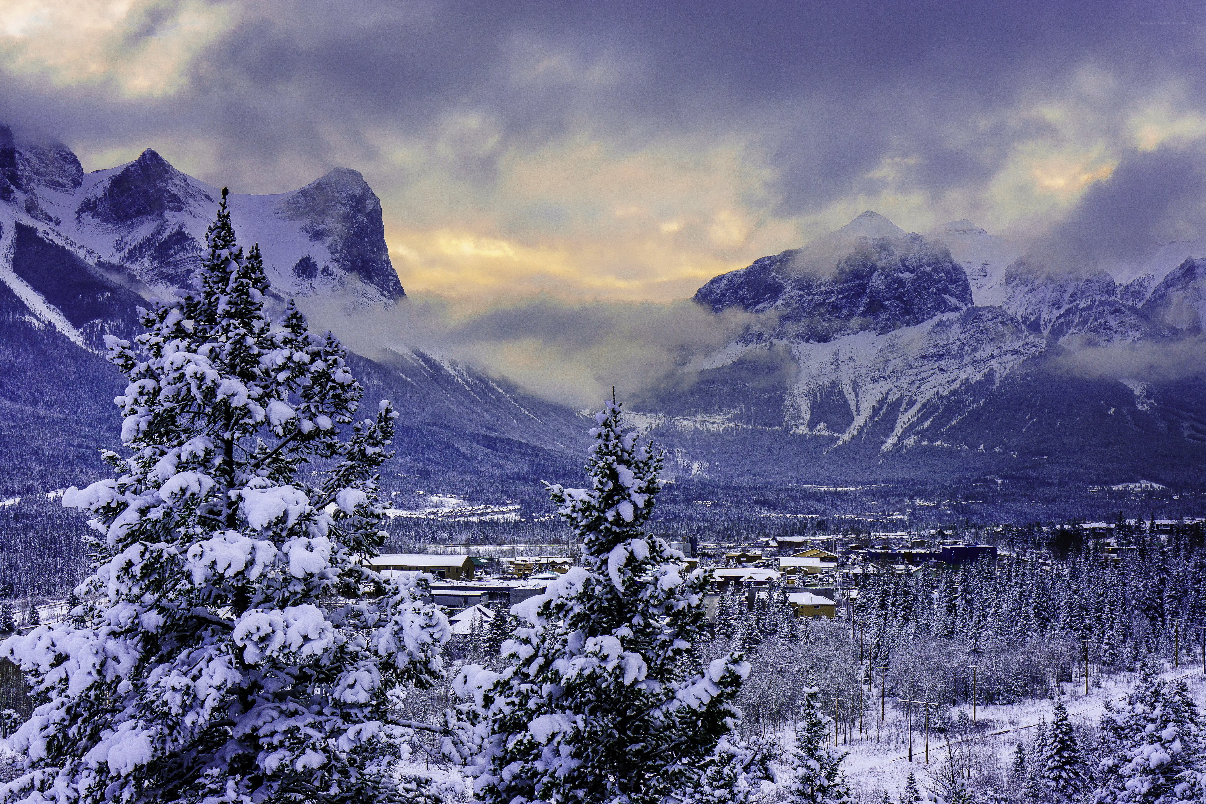 Snowy mountain town at dusk