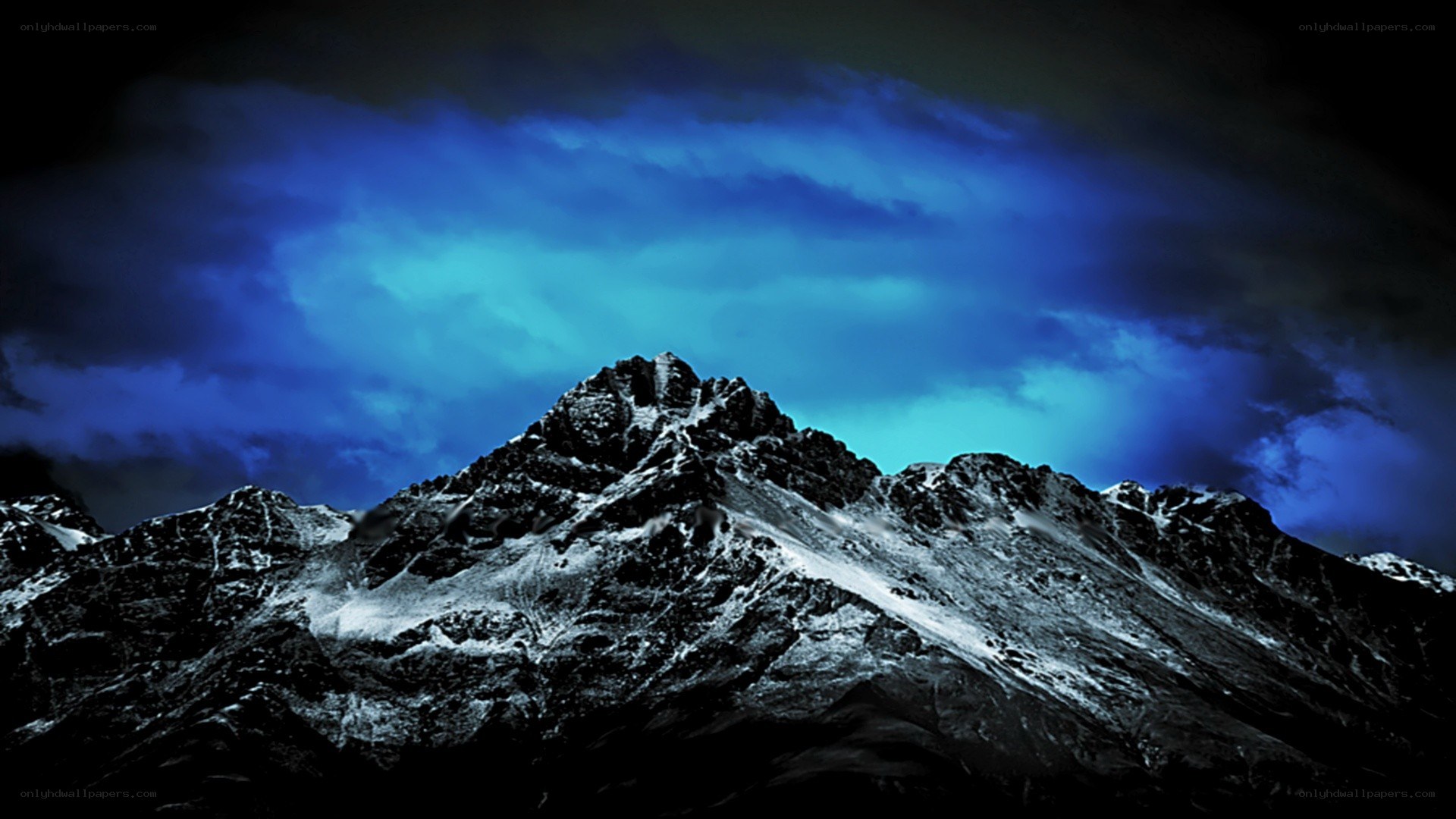 snowy mountain under blue sky