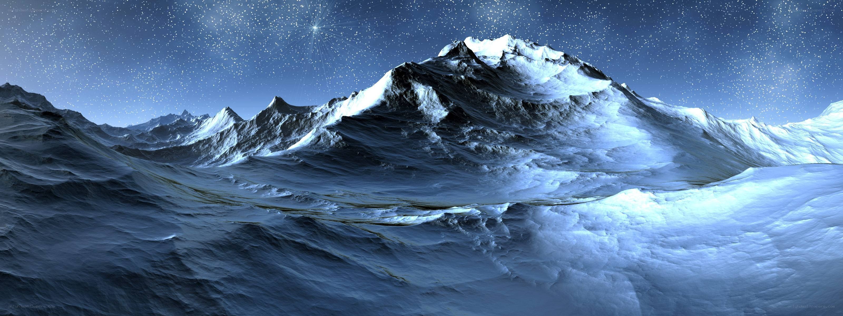 Snowy mountain under starry sky