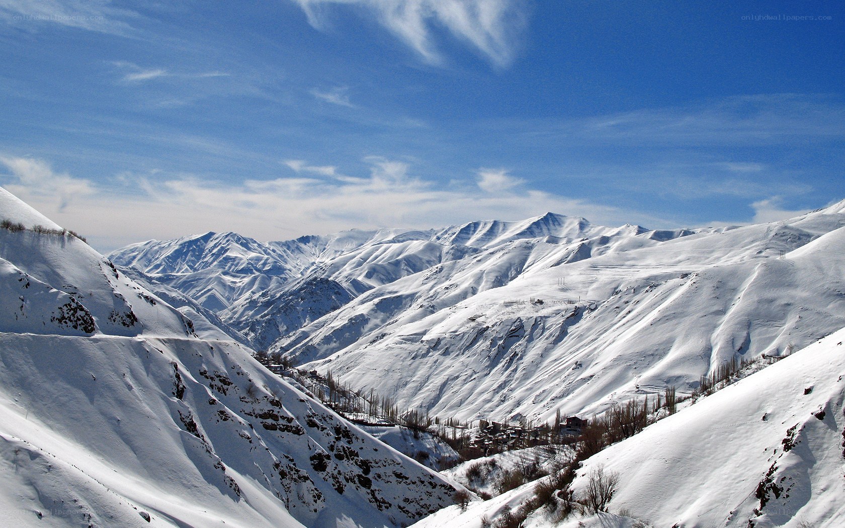 Snowy mountain valley landscape
