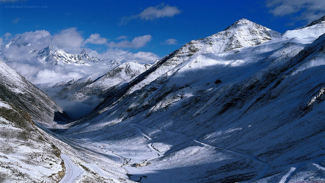 Snowy mountain valley landscape