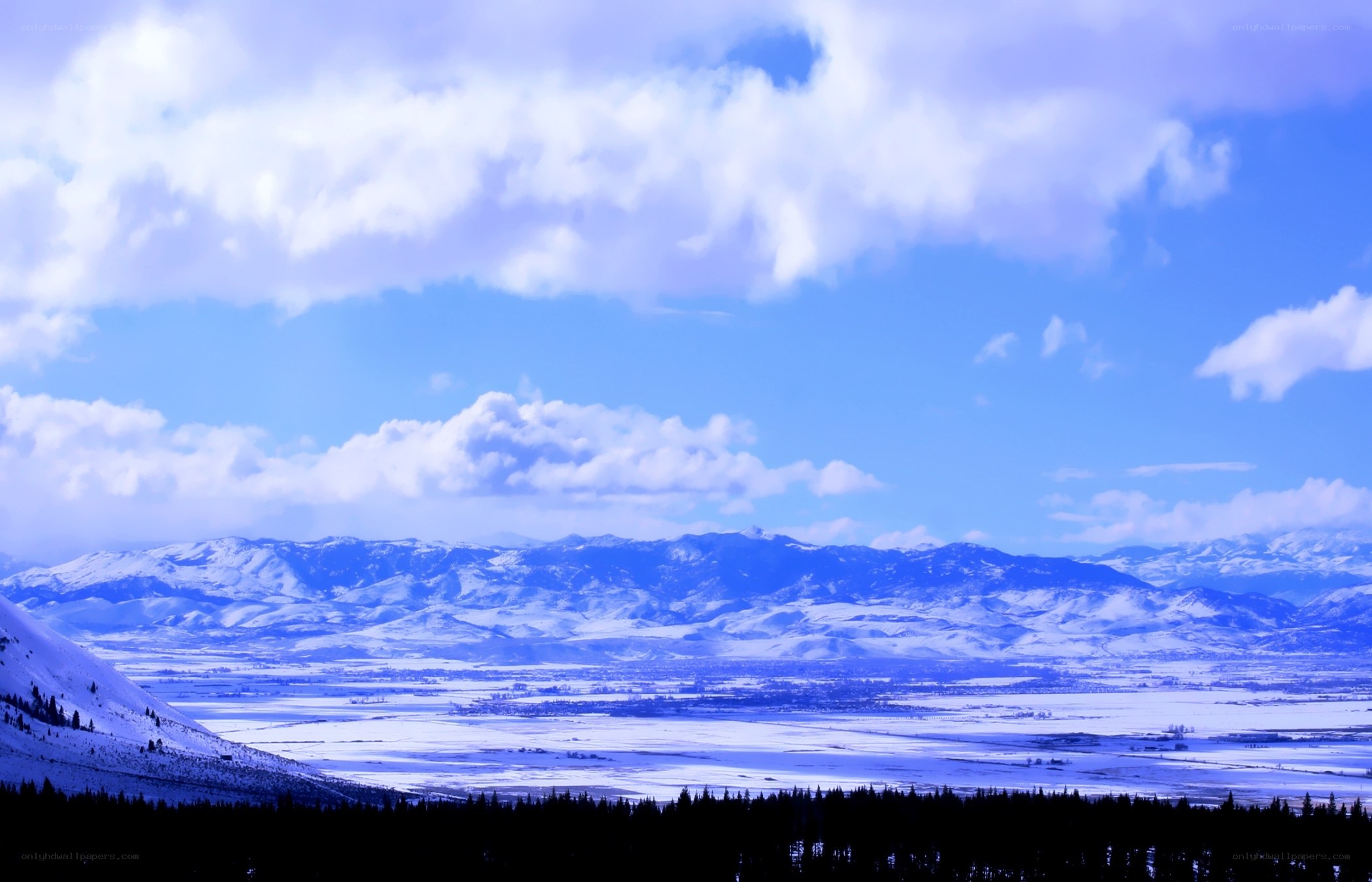 Snowy mountain valley landscape