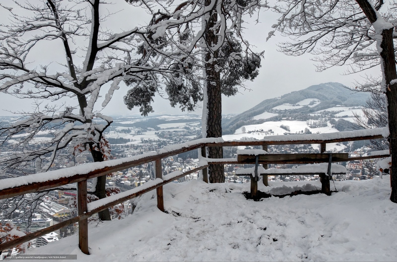 Snowy mountain view from bench