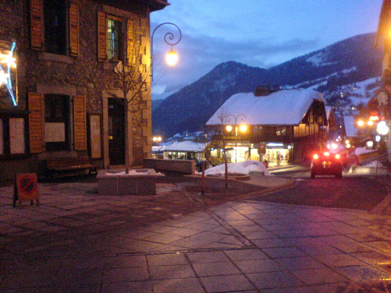 snowy mountain village at dusk