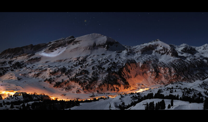snowy mountain village at night