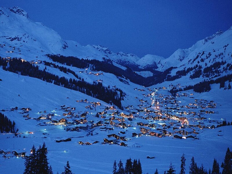 snowy mountain village at night