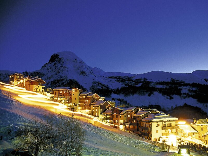 snowy mountain village at night