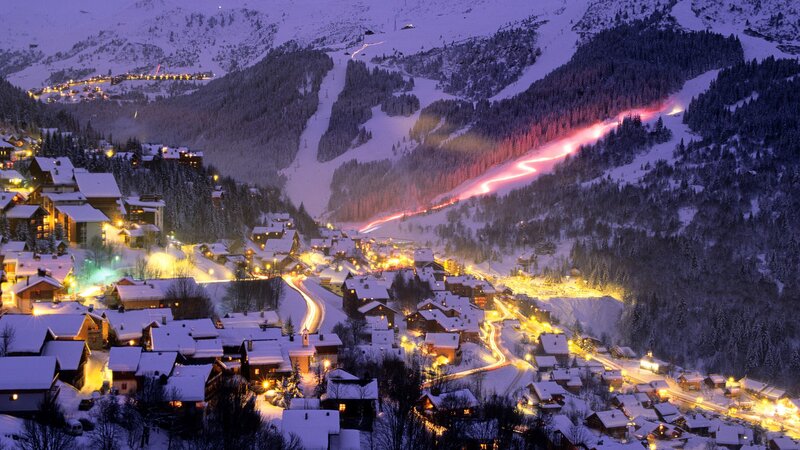 snowy mountain village at night