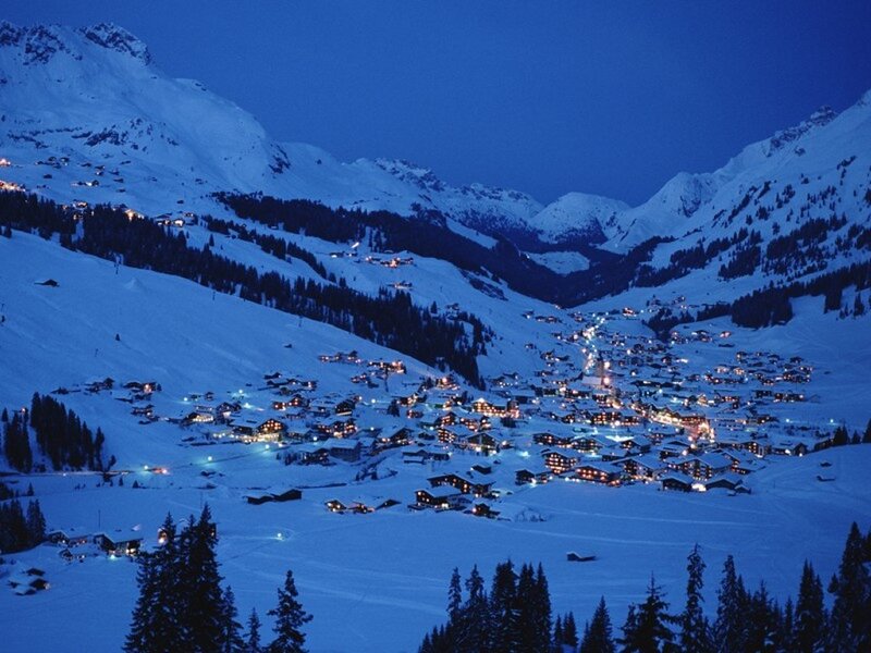snowy mountain village at night