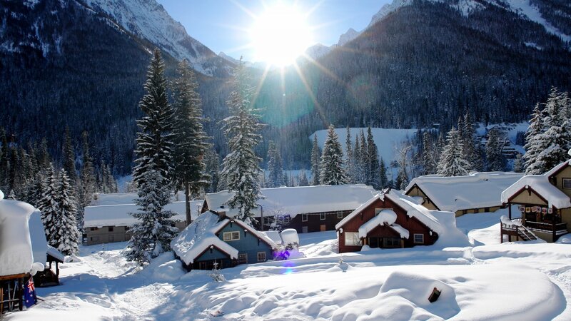 Snowy mountain village at sunrise