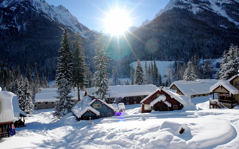 Snowy mountain village at sunrise