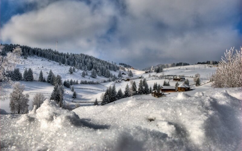 Snowy mountain village landscape