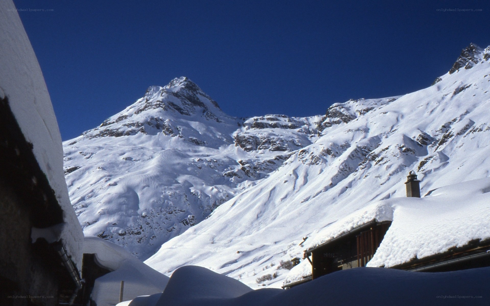 Snowy mountain village scene