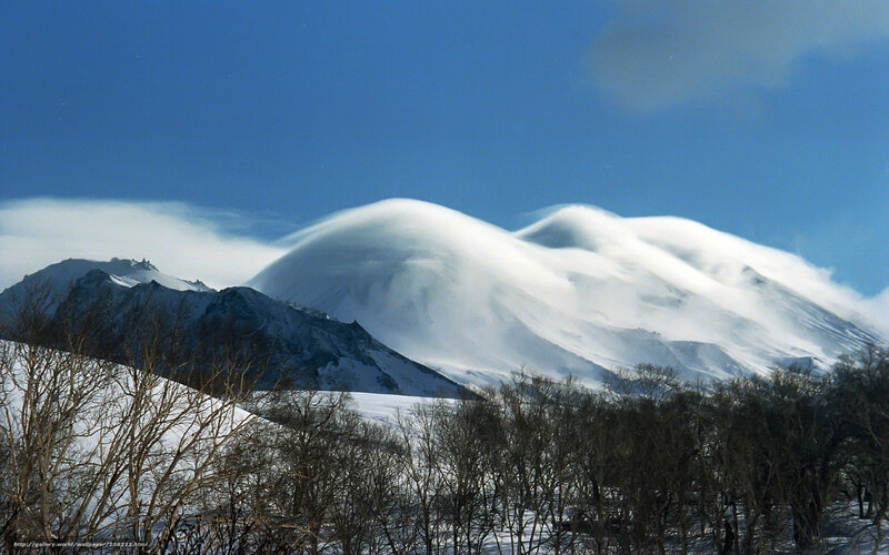 Snowy mountain with cloud formation