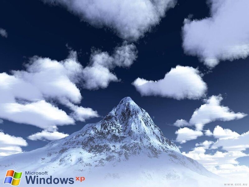 snowy mountain with clouds
