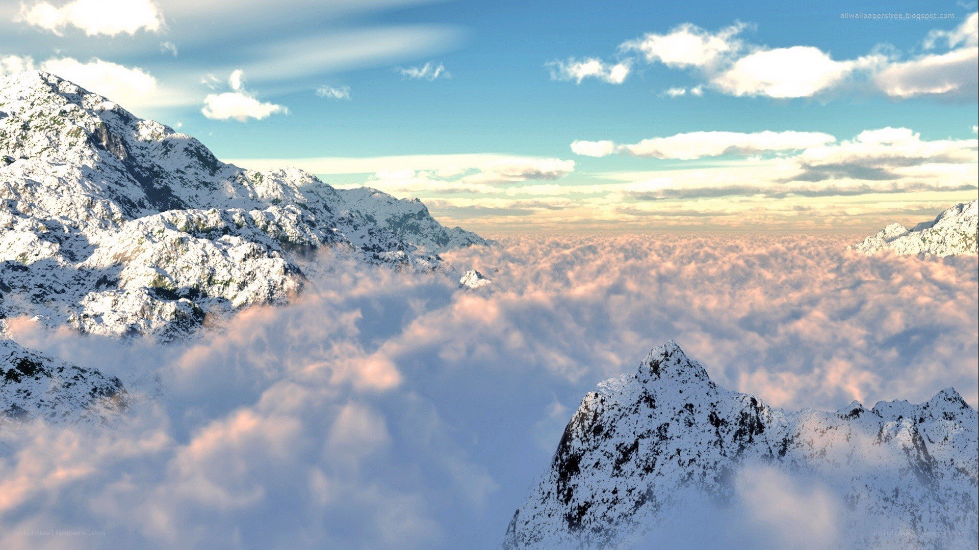 snowy mountains above clouds