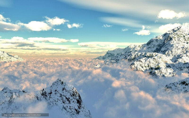 Snowy mountains above clouds