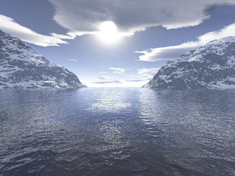 snowy mountains and calm sea