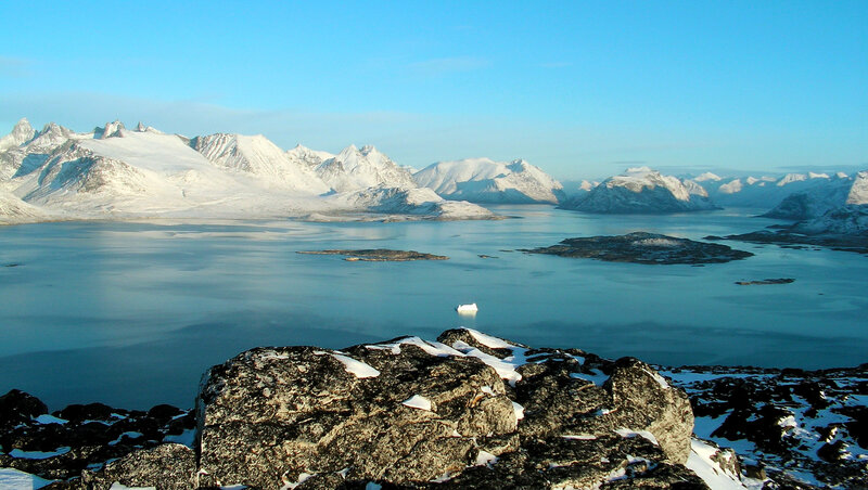 Snowy mountains and icy bay