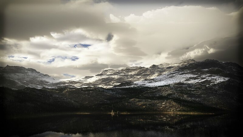 Snowy mountains and lake